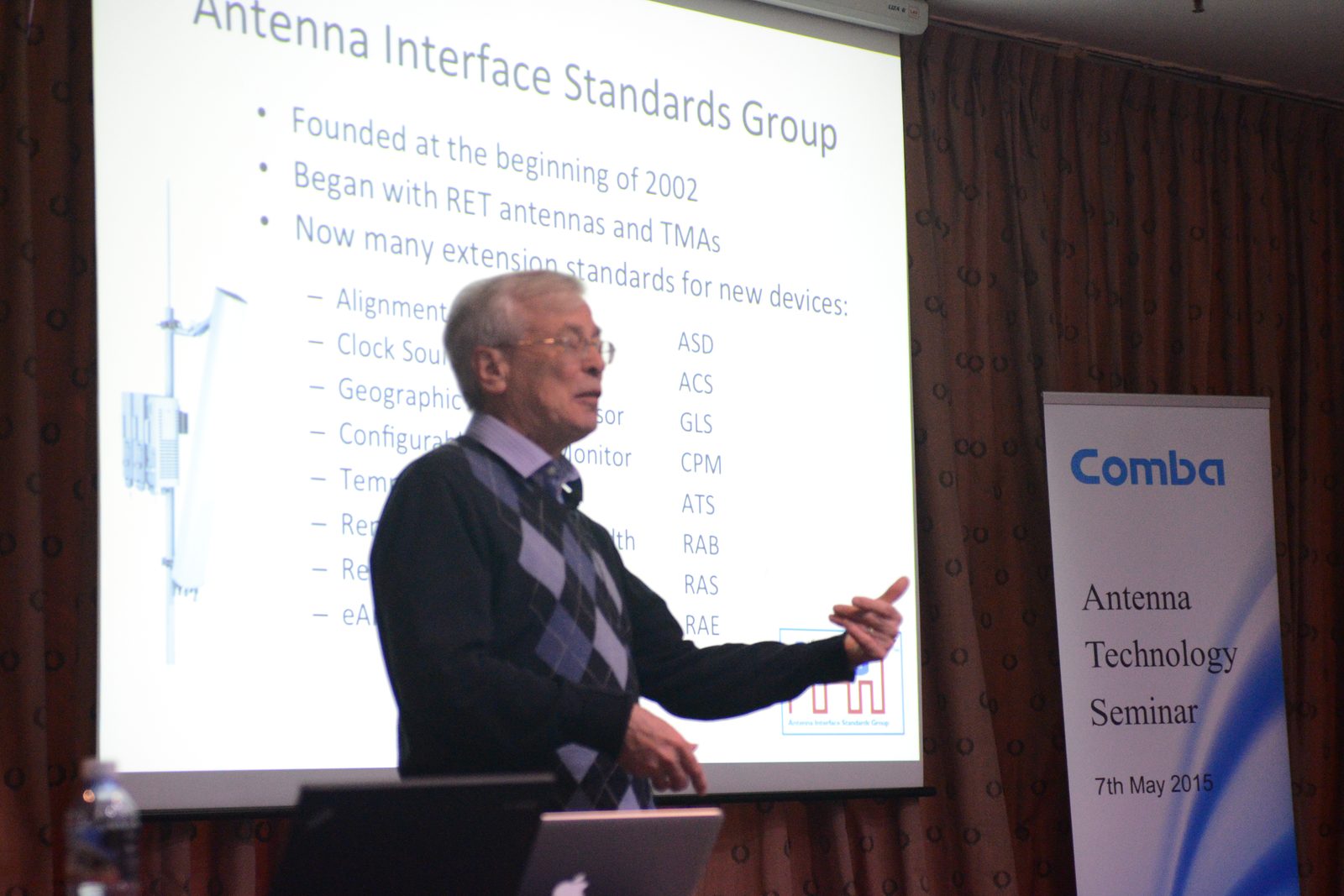Brian Collins presenting a slide on the Antenna Interface Standards Group